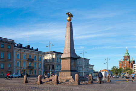 Helsinki, Finland - June 18 2019: The Imperial Stone is the oldest public monument in Helsinki, designed by Carl Ludvig Engel in 1833 at the Market Square.のeditorial素材