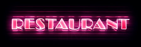 Close-up on a pink neon light shaped into the word "Restaurant".の写真素材