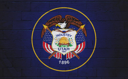 Flag of Utah painted on a cinder block wall.の写真素材