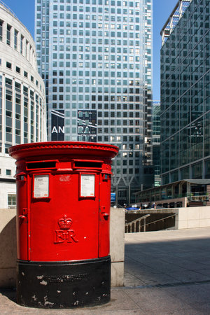 London, United Kingdom - June 03 2007: An English red pillar box with two apertures, one for stamped, and the other for franked mails.のeditorial素材