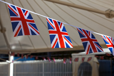 Garland of British flags to celebrate the King's Birthday.の写真素材