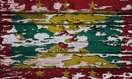Flag of Grenada painted on a grunge wooden board.の写真素材