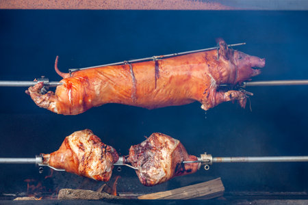 Spit Roasted pig on the traditional barbecueの写真素材