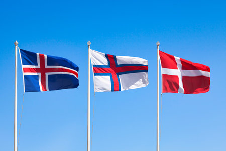 Flags of Iceland, Faroe Islands and Denmark side e by side.の写真素材
