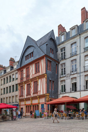 Nantes, France - July 26 2017: At the south-east corner of the Place du Change, the half-timbered house, known as the "maison des Apothicaires" or "maison du Change", dating from the fifteenth century, is considered the most beautiful half-timbered house のeditorial素材