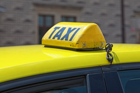 Yellow taxi sign from Prague in Czech Republic.の写真素材