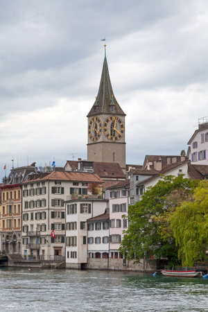 Zurich, Switzerland - June 12 2018: Spire of the St. Peter Pfarrhaus above the roof.のeditorial素材