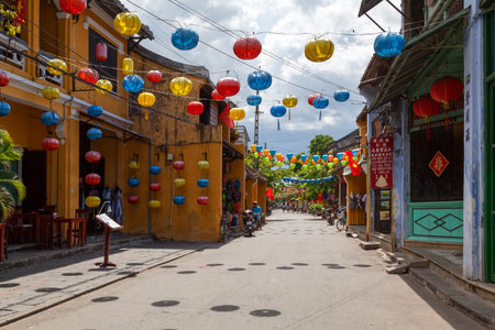 Hoi An, Vietnam - August 21 2018: Traditional buildings in a commercial street of the old town.