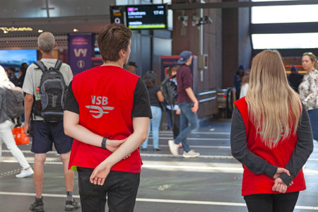 Oslo, Norway - June 26 2019: Employees of the NSB Railways waiting to assist passengers in need at...