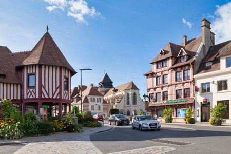 Pont-l'EÌvÃªque, France - October 13 2021: The tourist office and the pharmacy (both...