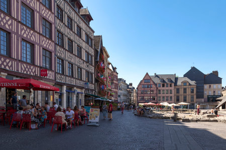 Rouen, France - August 07 2020: Half-timbered townhouses on Place du Vieux MarchÃ© opposite the Church of St Joan of Arc (French: Ãglise Sainte-Jeanne-d'Arc).のeditorial素材