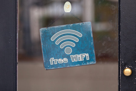 Blue sign with written in it Free WIFI.
