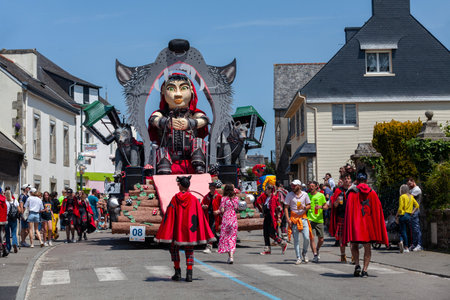 ScaÃ«r, France - May 29 2023: Little Red Riding Hood themed float of the Carnaval Ã  l'ouest. The carnival takes place every two years (odd years) during the Pentecost weekend.のeditorial素材