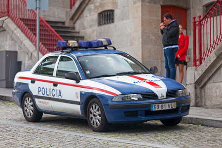 Porto, Portugal - June 03 2018: Police car parked outside a police station in the old town.のeditorial素材