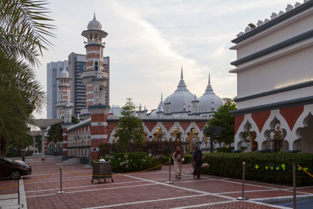 Kuala Lumpur, Malaysia - September 12 2018: Jamek Mosque, officially Sultan Abdul Samad Jamek Mosque, is one of the oldest mosques in capital city. It is located at the confluence of the Klang and Gombak River and may be accessed via Jalan Tun Perak.のeditorial素材