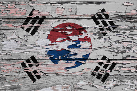 Flag of South Korea painted on a grunge wooden board.の写真素材