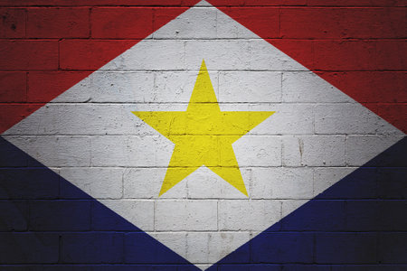 Flag of Saba painted on a cinder block wall.の写真素材