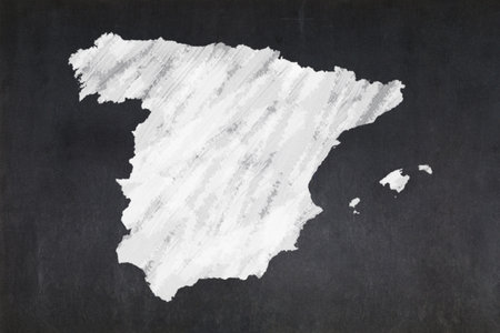 Blackboard with a the map of Spain drawn in the middle.の写真素材