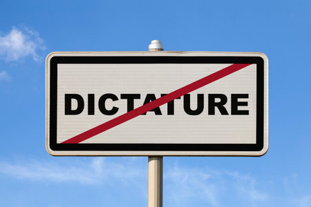 A French exit city sign against a blue sky with written in the middle.の写真素材