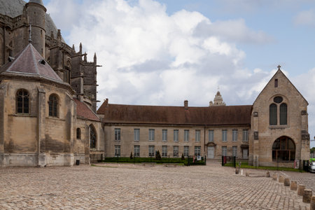 Senlis, France - July 19 2017: Parvise of the cathedral Notre-Dame de Senlis with the old episcopal palace. An Episcopal Palace (also known as a Bishop's Palace) is, or has been in the past, the official residence of a bishop.のeditorial素材