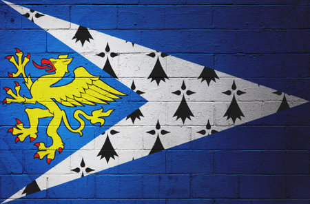 Flag of Bro Sant-Brieg (Pays de Saint-Brieuc) painted on a cinder block wall.の写真素材