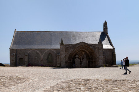 Plougonvelin, France - July 24 2017: The chapelle Notre-Dame-de-GrÃ¢ce at the pointe Saint-Mathieu. It is located near Le Conquet in the territory of the commune of Plougonvelin in France, flanked by 20m high cliffs.のeditorial素材