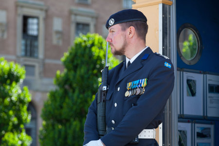 Stockholm, Sweden - June 22 2019: Soldier of the Swedish Army Service Troops guarding the entrance...