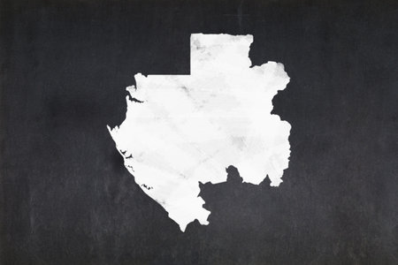 Blackboard with a the map of Gabon drawn in the middle.の写真素材