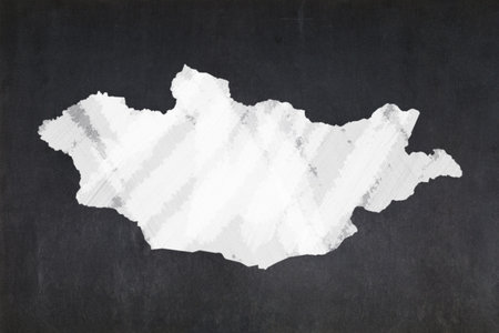 Blackboard with a map drawn in the middle.の写真素材