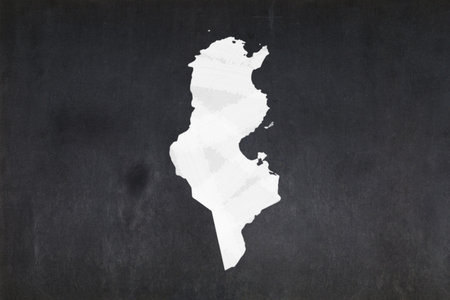 Blackboard with a the map of Tunisia drawn in the middle.の写真素材