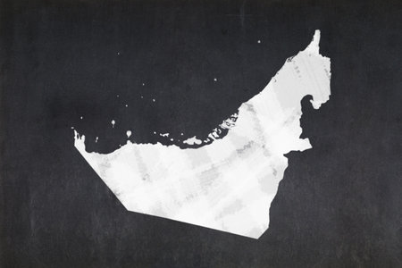 Blackboard with a the map of the United Arab Emirates drawn in the middle.の写真素材
