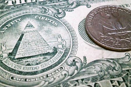 Close-up on a 1 dollar bill with the focus on the Eye Of Providence and on the eagle.の写真素材