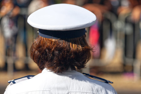 Saint Denis, Reunion - July 14 2016: Female police officer parading during Bastille Day.