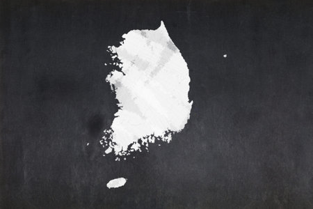 Blackboard with a the map of South Korea drawn in the middle.の写真素材