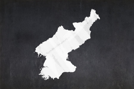 Blackboard with a the map of North Korea drawn in the middle.の写真素材