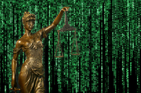 Close-up of a small bronze statuette of Lady Justice.の写真素材