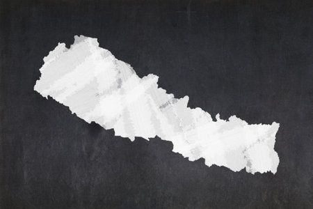 Blackboard with a the map of Nepal drawn in the middle.の写真素材