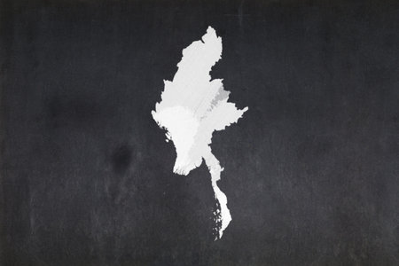 Blackboard with a the map of Myanmar drawn in the middle.の写真素材