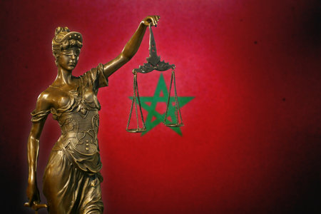 Close-up of a small bronze statuette of Lady Justice.の写真素材