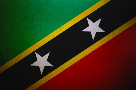 Flag of Saint Kitts and Nevis printed on a paper sheet.の写真素材