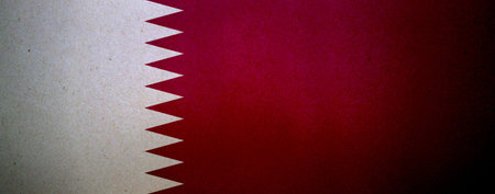 Flag of Qatar printed on a paper sheet.の写真素材