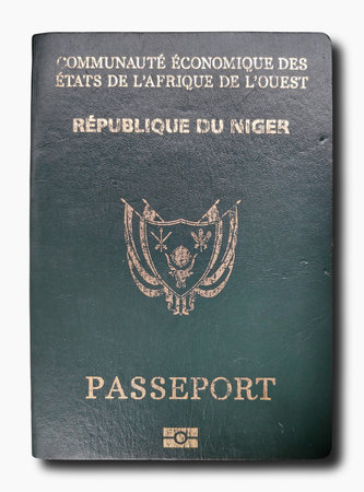 Close-up on a passport from the Republic of the Niger isolated on a white background.の写真素材