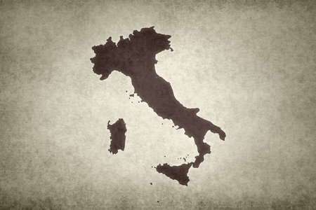 Grunge map of Italy printed within on an old paper.の写真素材