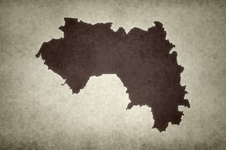 Grunge map of Guinea printed on an old paper.の写真素材