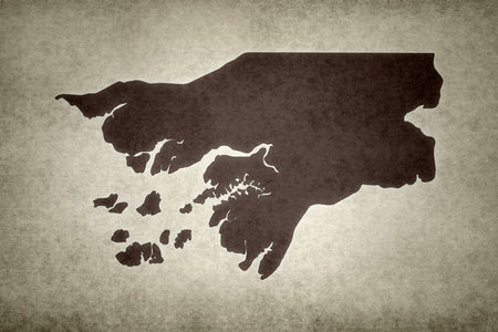 Grunge map of Guinea-Bissau printed on an old paper.の写真素材