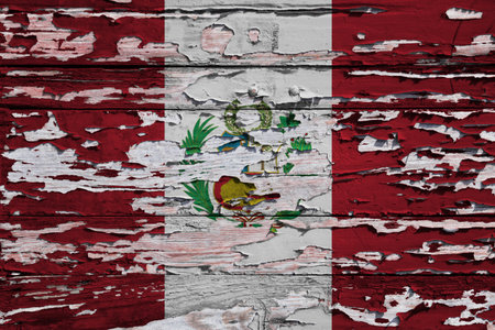 Flag of Peru painted on a grunge wooden board.の写真素材