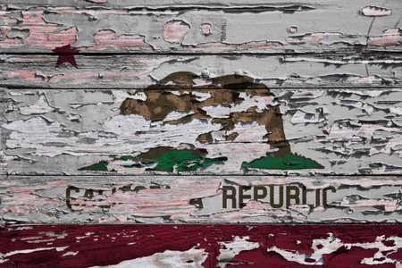 Flag of California painted on a grunge wooden board.の写真素材