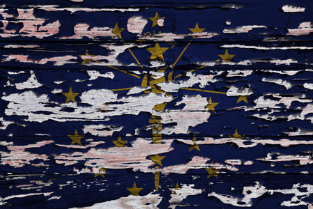 Flag of Indiana painted on a grunge wooden board.の写真素材