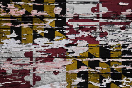Flag of Maryland painted on a grunge wooden board.の写真素材