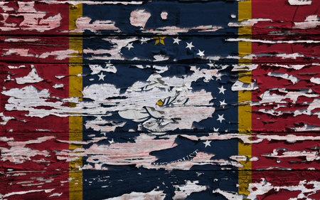 Flag of Mississippi (USA) painted on a grunge wooden board.の写真素材